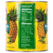 A Del Monte #10 can of pineapple chunks in juice with a nutrition label.