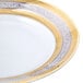 A white porcelain 10 Strawberry Street Elegance bread and butter plate with a gold rim.