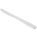 A Libbey stainless steel dinner knife with a white background.