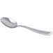 A Libbey stainless steel dessert spoon with a curved handle.
