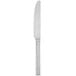 A Libbey stainless steel dinner knife with a solid handle.