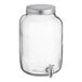 An Acopa clear glass Mason jar beverage dispenser with a silver lid.