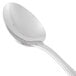 A Libbey stainless steel dessert spoon with a silver handle.