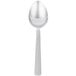 A Libbey stainless steel dessert spoon with a white handle.