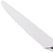 A Libbey Contempra stainless steel dinner knife with a silver handle.