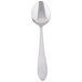 A silver Libbey dessert spoon with a curved design on a white background.