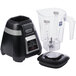 A Waring black and silver blender with a clear copolyester container and electronic keypad controls.