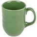 A close-up of a green Libbey Cantina mug with a handle.