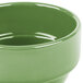 A close up of a stackable sage green Libbey porcelain bouillon bowl.