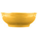A yellow Libbey porcelain bowl.