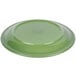 A sage green Libbey porcelain plate with a circular carved rim.