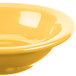 A close-up of a yellow Libbey Cantina fruit bowl.