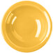 A yellow bowl with a white and yellow circle.