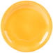 A yellow Libbey Cantina porcelain plate with wavy lines.