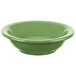 A close-up of a sage green Libbey porcelain fruit bowl.