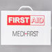 A white Medique first aid kit cabinet with red and black text.