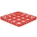 A red plastic glass rack extender with a grid pattern.