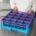 A person holding a purple Carlisle glass rack extender with blue and purple glass racks inside.