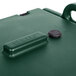 A green plastic Cambro soup carrier with a black lid and handle.