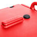 A red Cambro insulated soup carrier with lid and black handles.
