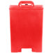 A red plastic container with a lid and handles.