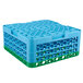 A stack of green plastic Carlisle OptiClean glass racks with blue extenders.
