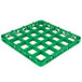 A green plastic Carlisle glass rack extender with 25 squares in four rows.