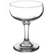 A clear Libbey Coupe Glass with a stem and base.