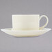 A white 10 Strawberry Street cup and saucer with a black border.
