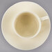 A 10 Strawberry Street Royal Cream white porcelain cup and saucer with a white rim.