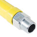 A yellow T&S Safe-T-Link gas appliance connector hose with metal fittings.