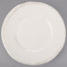 A white Libbey porcelain plate with brown trim.