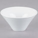 A close up of a Libbey Ultra Bright White Porcelain Normandy Bowl with a small rim.
