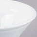 A close-up of a Libbey ultra bright white porcelain bowl with a white rim.