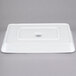 A white rectangular Libbey porcelain pan with a logo on it.