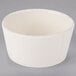 A white Libbey porcelain bowl with a rim.