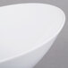 A Libbey Chef's Selection II white porcelain bowl with a curved edge.