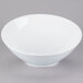 A Libbey white porcelain bowl with a white rim.