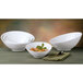 A group of Libbey white porcelain Belmar bowls on a table.