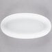 A white Libbey porcelain oval bowl.