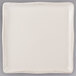 A white square Libbey porcelain tray with a small ivory border.