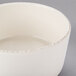 A close up of a Libbey Farmhouse ivory porcelain bowl with a small rim.