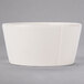 A Libbey ivory porcelain sauce bowl with a small rim.