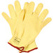 A pair of yellow Cordova cut resistant gloves with red trim.