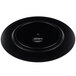 A black circular melamine charger plate with a faux wood design.