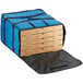 A blue Choice insulated bag with pizza boxes inside.