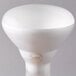 A close-up of a Satco white halogen flood light bulb with a white frosted finish.