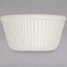 A white Carlisle fluted ramekin with a ribbed pattern on a white surface.