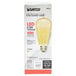 A Satco transparent amber LED light bulb in a white box.