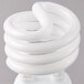A white spiral Satco mini compact fluorescent light bulb.